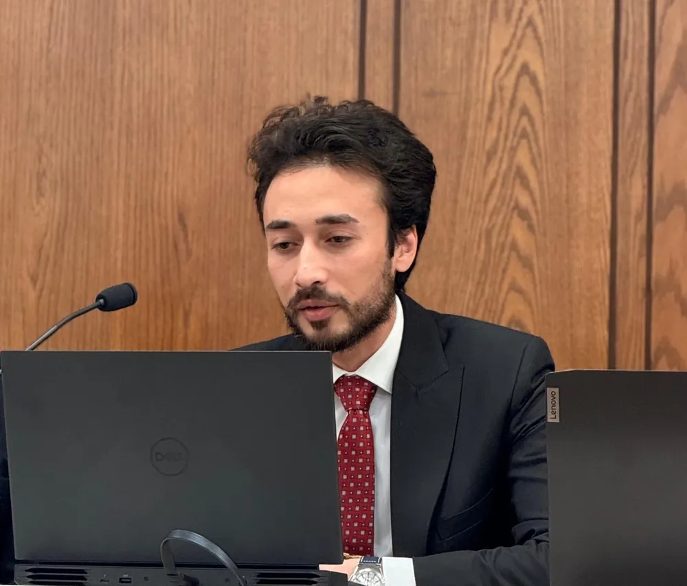 Ahmed walking the panel through the project
